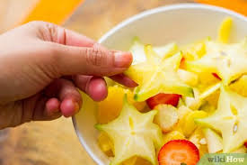 (iii) cut off the stem end of the star fruit. How To Eat A Star Fruit 14 Steps With Pictures Wikihow