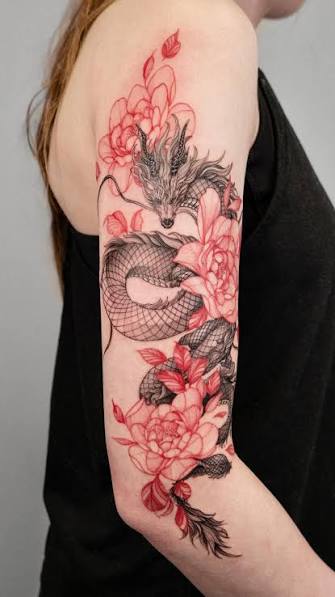 Upper arm sleeve dragon with red flower ,thank you for the far drive from Utah // by @wong_tattooer , booking open // customized design . , fineline//outline//realism//cover up tattoo & design , Based ...