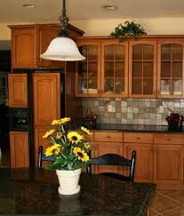 Kitchen w maple cabinets with cherry stain and mocha glaze uba tuba granite tumbled marble backsplash wall color. 15 Uba Tuba Granite Options To Create Elegance In Your Home