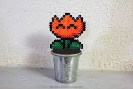 Diy Fleur Mario En Perles A Repasser Diy Orange Planter Pots