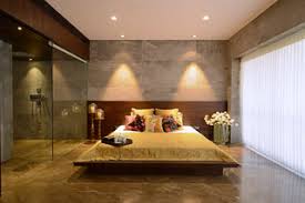 This is an example of an extravagant, lavish look of a bedroom. Bedroom Wall Tile Photos Designs Ideas
