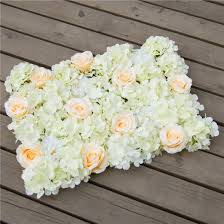 Wedding flower bouquet using open pale pink sweet avalanche, cream vendela, and peach avalanche roses, threaded through pale green hydrangea, bound in ivory satin and pinned with pearls. Artificial Pink Silk Flower Backdrop Rose Hydrangea Flower Wedding Wall Decor Backdrop China Artificial Flowers And Silk Flowers Price Made In China Com