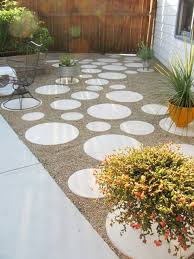 Adding a small canopy or umbrella, flowers in pots, twinkle lights and a tabletop. 9 Diy Cool Creative Patio Flooring Ideas The Garden Glove
