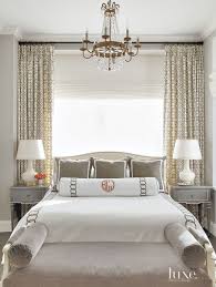 Bedroom blinds should be multifunctional, offering light control, blackout properties, thermal efficiency and style. Bedroom Window Behind Bed With Drapes In Pelagos Mist And Roman Shade And Sheer Luxe Interiors Small Master Bedroom Home Decor Bedroom Bedroom Drapes