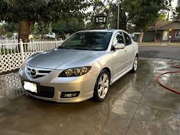 Image result for Sunlight Silver 2007 Mazda3