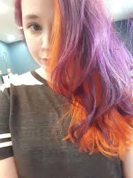 Orange And Purple Split Dyed Hair Bright Hair Rainbow Hair Aveda Colors Aveda Salon Dyed Hair Split Dyed Hair Bright Hair