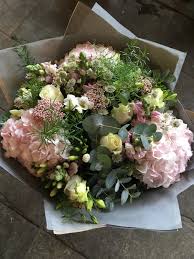 Beautiful Hand Tied Bouquet Of Flowers With Soft Pink Hydrangea Cream Roses Astrantia And Fragrant Freesia Complemented With Eucalyptus B Pink Hydrangea Bouquet Pink Hydrangea Wedding Hand Tied Bouquet