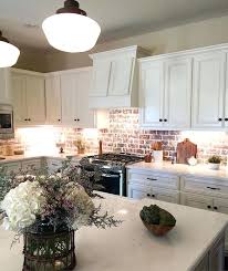 White Brick Backsplash In Kitchen Create An Elegant Statement With A White Brick Wall Design Ideas White Kitchen Red Brick Kitchen Kitchen Remodel New Kitchen