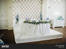 The area was decorated with a fun tablecloth, a macramé runner, and a garland. Wedding Bride Groom Image Photo Free Trial Bigstock