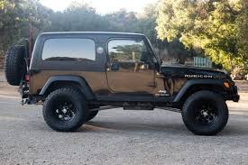 Image result for Brilliant Black 2005 Jeep