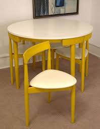 All Tucked In Hans Olsen S Super Space Saving Dining Set Space Saving Dining Table Dinette Sets Furniture
