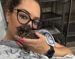 Cranberry loves being cuddled and picked up