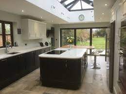 Graphite Bottom Cupboards And Porcelain Top Cupboards Island With Induction Hob And Zebrano Breakfast Bar Kitchen Extension Kitchen Design Room Extensions