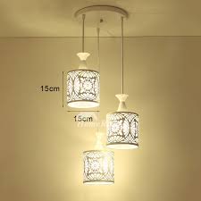 Crafted of flat, tubular steel in a fashionable finish, the frame strikes a simple, open orb silhouette, while a single streamlined bulb holder stands firmly in its center. Foyer Pendant Lighting 3 Light Kitchen Modern White Chassis Fish Line Chandelier Carved World Map