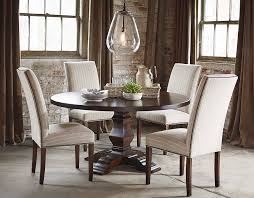 A 48 inch round dining table ensures four people are comfortable during the meal, and a 60 inch dining table provides plenty of room for serving dishes as well as place settings. Benchmade Tavern 60 Inch Table By Bassett