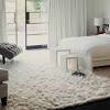 If the headboard of the bed is against a wall when it comes to choosing the right rug for your living room or bedroom, the most important things to consider are 1