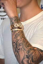 A Guide To Justin Bieber S Tattoos So You Can Stop Wondering What Do They Mean Sleeve Tattoos Men Tattoos Arm Sleeve Justin Bieber Tattoos