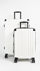 Calpak is a california brand that manufactures just that. Calpak Ambeur 2 Piece Spinner Luggage Set In White Modesens