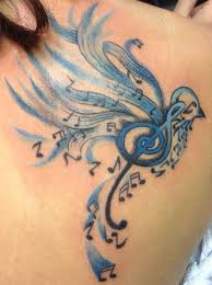 Singing Like A Bird Blue Bird Tattoo Idea With Music Notes Music Bird Tattoos Music Tattoo Designs Music Tattoos