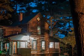 Decorated in the traditional style, this cabin features a comfy couch and a gas fireplace, perfect for cuddling with your beloved on cold nights. Weekend Packing List For A Cabin Getaway Girl Of 10 000 Lakes