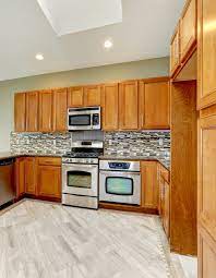 Common kitchen tile materials include ceramic, porcelain, stone, travertine. Tile Flooring In Kingston Ceramic Tile Floors