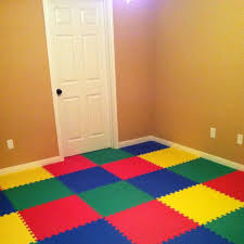 Our Kids Playroom We Used Giant Foam Puzzle Pieces For The Floor And Painted Brown To Cover Up Kid Mess Playroom Kids Mess Kids Playroom