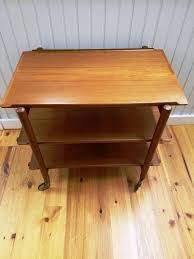 If you are a baby boomer, then it will take you back to your youth or at least the 50's or 60's. Mid Century Modern Era Solid Teak Rolling 3 Tier Bar Cart All Etsy