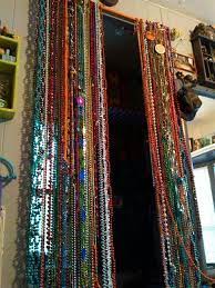 Beaded Curtain Diy Mardi Gras Beads Curtain Rod Time Still Working On It Beaded Door Curtains Diy Curtains Boho Curtains