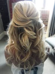Nothing says romantic like a head full of soft, cascading part your hair in the center before raking the sides back and securing everything with an elastic to keep it. 37 Beautiful Half Up Half Down Hairstyles For The Modern Bride Tania Maras Bespoke Wedding Headpieces Wedding Veils