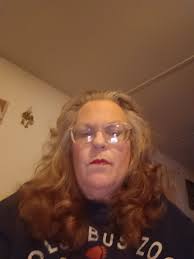 What hairstyle suits a 58 year old grandma with shoulder length hair?