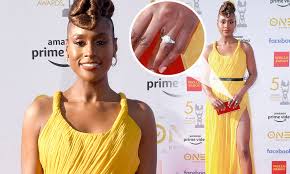 The insecure star, 36, revealed that she married longtime beau louis diame on sunday, july 25, sharing glamorous photos from her destination. Issa Rae Flaunts Her Giant Diamond Ring As She Attends The Naacp Awards Daily Mail Online