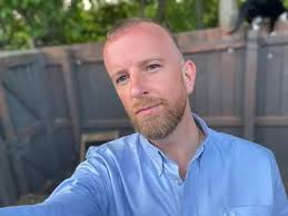 UK's first openly gay state school head comes out by introducing husband in  assembly