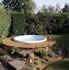 People Are Always Searching For Ways To Incorporate The Hot Tub Into The Landscape Especially When It Has Jacuzzi Outdoor Hot Tub Landscaping Pool Landscaping