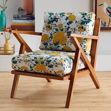 Offering comfort with a thick padding seat cushion and back support, paired with a side/end table, the accent side chair perfectly creates a comfy reading or relaxing spot. Drew Barrymore Flower Home Vintage Floral Mid Century Accent Chair