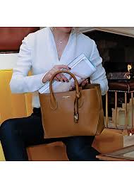 Aspinal of london is a london designer, manufacturer and retailer of luxury leather goods and accessories for men and women. Aspinal Of London London Tote Midi Tan Smooth Harvey Nichols
