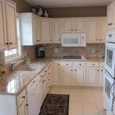 Check out our facebook page: Oak Cabinets To White Enamel With Glaze Painterati