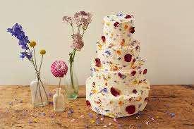 Maybe you would like to learn more about one of these? This Three Tier Wedding Cake Has Been Iced With Butter Cream And Decorated With Edible Flowers Sandhole Oak Barn