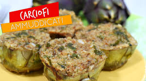 I carciofi ripieni ai pomodori secchi sono una sfiziosa variante dei più tradizionali carciofi ripieni alla siciliana. Carciofi Ammuddicati Alla Siciliana Carciofi Ripieni Alla Siciliana Ricetta Siciliana Semplice Youtube