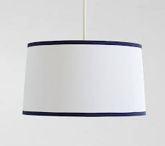 This practical overhead lighting solution helps to eliminate shadows and distribute light evenly. White Navy Drum Kids Flush Mount Light Pottery Barn Kids