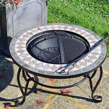 Includes spark screen, log grate, protective storage cover, and log poker tool. World Menagerie Ilkley Steel Wood Burning Fire Pit Table Reviews Wayfair Co Uk