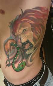 In these art pieces, the images symbolize a balance between the feminine and the masculine. 42 Latest Lion Tattoos For Rib