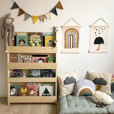 My kids will clean up their bedroom and a few days later it is a mess again. Hat Books Do You Read On A Rainy Day Do You Have A Special Book That You Read Together Lovely Book Collecti Tidy Books Kids Bookcase Kids Room Inspiration