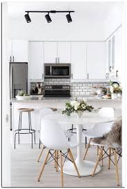 Minimalist And Modern Apartment In The Heart Of Paris In 2020 Living Room Dining Room Combo Small Modern Kitchens Apartment Dining
