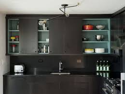 Sliding Upper Cabinet Doors W Pop Of Color Brick House Black Kitchens Kitchen Cabinets Black Kitchen Cabinets
