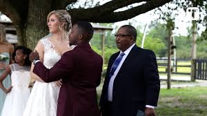 Cheeky father of bride gives groom *** stool to kiss taller wife ...