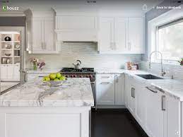 The owners of the home wanted the cardiff marble backsplash to take center stage. White Kitchen Houzz White Kitchen Design Modern Kitchen Design White Kitchen Backsplash