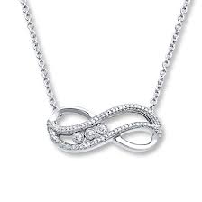 Black And White Diamond Intertwining Infinity Necklace Earrings And Bracelet Your Diamonds Will Move With You Down The Aisle In This Infinity Necklace From The Diamonds At Play Collecti Diamond Infinity Necklace Diamond Diamond Infinity