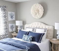The designers added custom paneling that introduces depth and texture to the wall. Wall Decor Above Curved Headboard Ideas Home Interiors Curved Headboard Headboard Art Headboard Wall