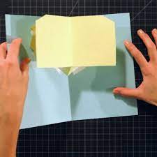 Fold your paper in half. How To Make A V Fold Lifter For A Pop Up Card Howcast