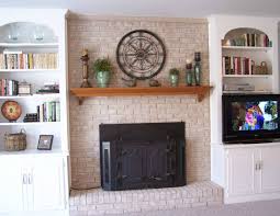 These floating timber shelves work wonderfully with the color of the steel cladding on the fireplace surround. Fireplace Decorating Fireplace Mantel Shelves An Easy Makeover